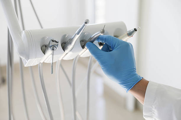 Professional Dental Implants technician working in Portales, NM